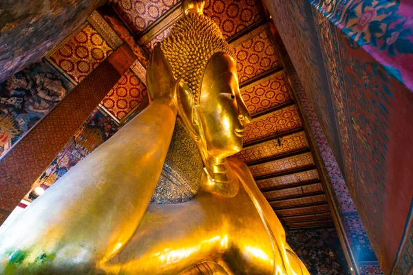 stock image Golden reclining buddha statue in pagoda sightseeing travel in Bangkok Thailand
