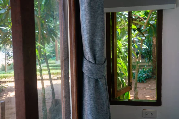 Wooden window curtain in ses resort room tropical resort