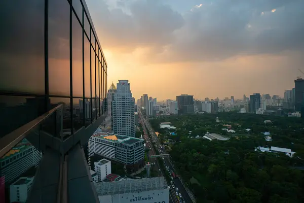 AErial view city green tree park around by modern office building Bangkok Thailand