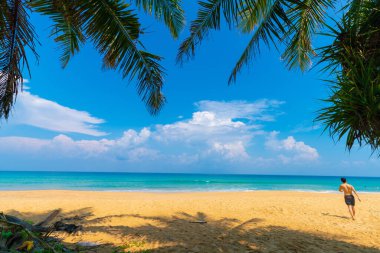 Serenity white snad sea wave beach against blue sky with cloud summer vacation