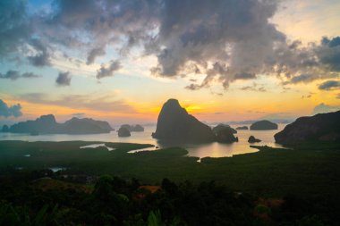 Mountain sunrise on mangrove forest sea bay sky cloud sightseeing travel in Phangnga Thailand