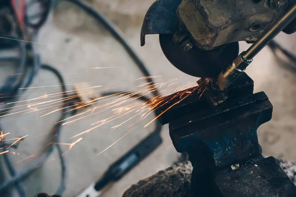 stock image Metal working man hand steel grinder industry business