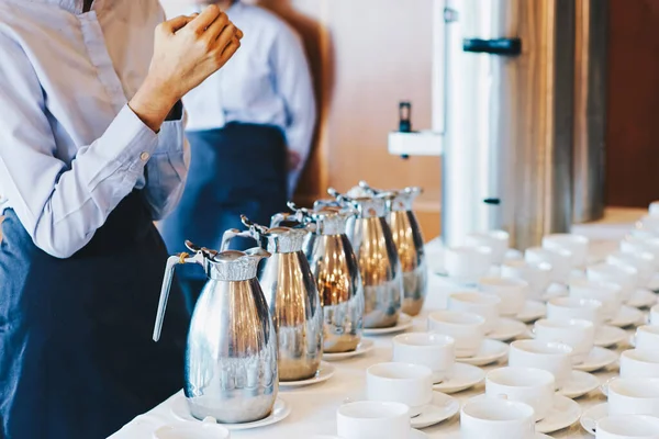 stock image Hot coffee cup on table in hotel seminar hall room business education background