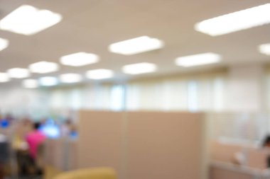 Blurred office interior space background in the workplace with computer shallow depth of focus of abstract background.