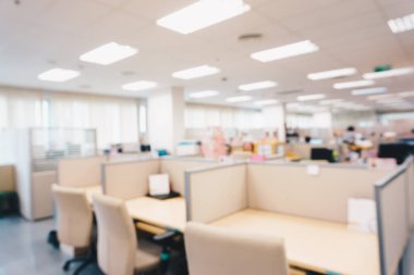 Blurred office interior space background in the workplace with computer shallow depth of focus of abstract background.