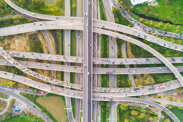 Intersection crossroad with vehicles movement aerial view by drone, City transport
