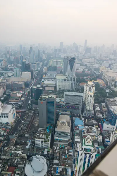 stock image Bangkok city buildings with citys road and fog at sunset