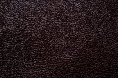 Koyu kahverengi tam tahıllı, hakiki deri sığır derisi arka plan, dekorasyon dokusu.