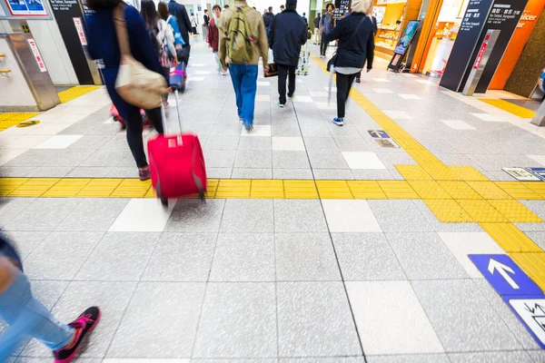 stock image Motion blurred tourists waiting for landing in airport 