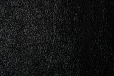 Hakiki siyah sığır derisi arka plan tam tahıllı deri doku gerçek deri.