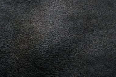 Hakiki siyah sığır derisi arka plan tam tahıllı deri doku gerçek deri.