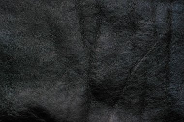 Hakiki siyah sığır derisi arka plan tam tahıllı deri doku gerçek deri.