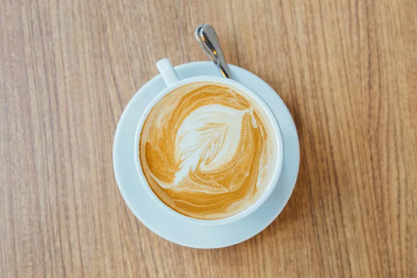 Vue Dessus Texture Feuille Café Latte Cappuccino Sur Table Bois — Photo