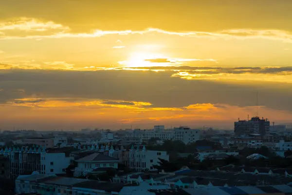 Sunrise with cloud and building in the city of Bangkok, Thailand