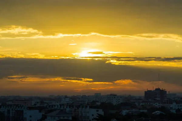 Sunrise with cloud and building in the city of Bangkok, Thailand
