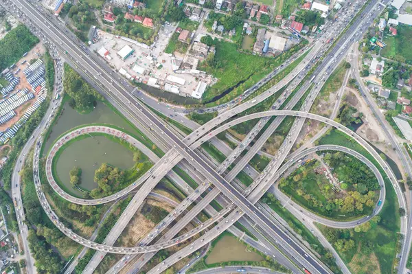 Intersection cross road with vehicle movement aerial view by drone, City transport