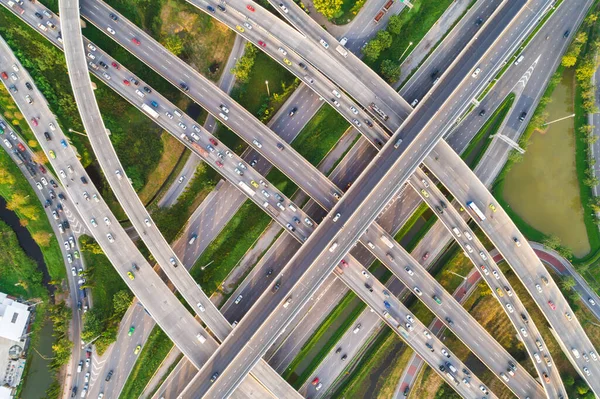 Intersection cross road with vehicle movement aerial view by drone, City transport