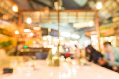 Müşteri ve yemek ile bulanık modern restoran, kafe arka planı