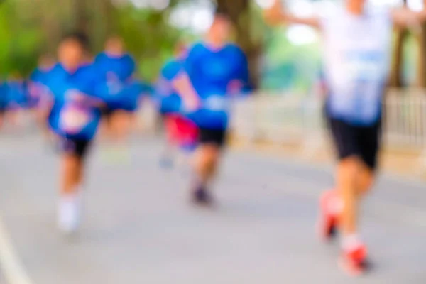 Verschwommene Marathonläufe Beeilen Menschen Hintergrund Für Gesunde Aktivität lizenzfreie Stockfotos