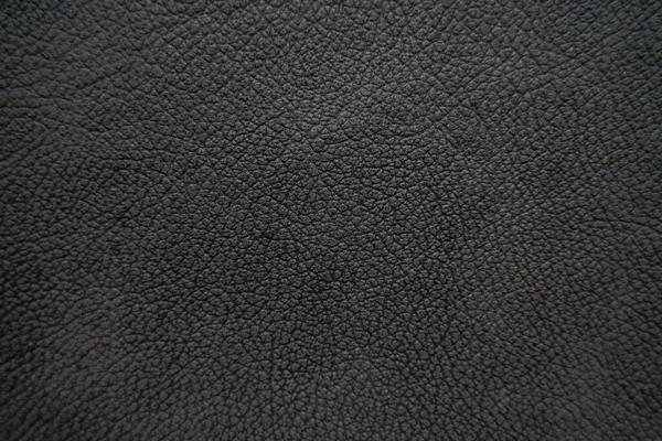 Genuine black leather texture empty leather background full grain cowhide