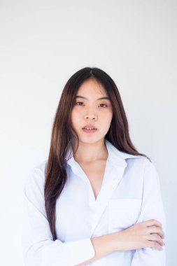 Portrait of beautiful young asian pretty woman white collar shirt on white background in studio