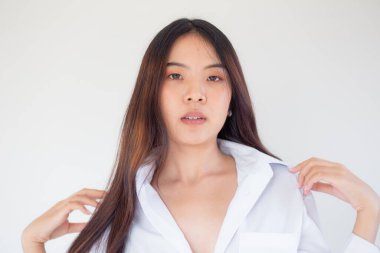Portrait of beautiful young asian pretty woman white collar shirt on white background in studio