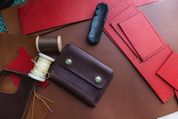 Leather wallet handmade working craftmanship background art object