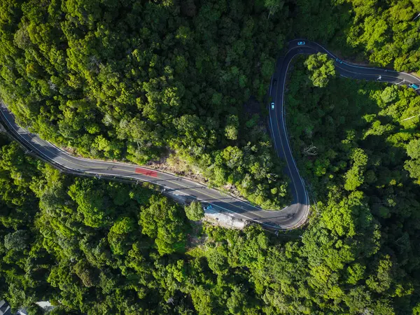 stock image Aerial view apshalt curve road on mountain tropical rainforest transport in nature