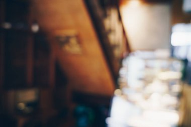 Bokeh aromalı bulanık kahve dükkanı. Arka planda tonlanmış resim içeceği.