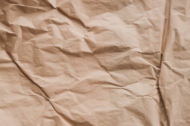 Açık kahverengi buruşuk kağıt arkaplan kopyalama alanı dokusu