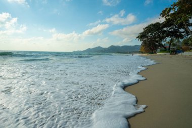 Sea beach wave turquoise water sunny day blue sky with cloud summer vacation Samui island Thailand clipart