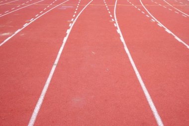 Kırmızı pistte koşan kauçuk şerit atletik arka plan kavramı