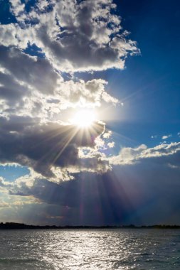 Windy evening on the lake at sunset
