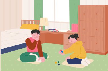 Korean childhood games. Children sitting in the room and playing the five stone game.