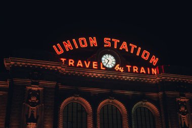 Travel By Train neon sign at Union Station, Denver, Colorado clipart