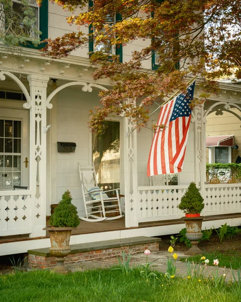 stock image House with American flag on Main Street, Nelsonville, New York