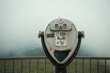 Coin operated binoculars on Mount Washington, New Hampshire clipart