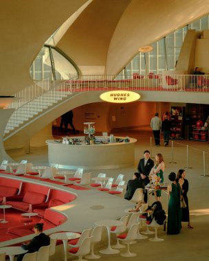 The interior of the TWA Hotel at JFK Airport, Queens, New York clipart