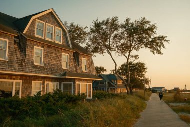 Houses along the bay in Saltaire, on Fire Island, New York clipart