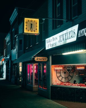 Walker Bros & Monroe Jewelers vintage sign at night, North Tonawanda, New York clipart