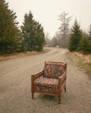 A chair sitting outside on a foggy day on Beals Island, Maine clipart