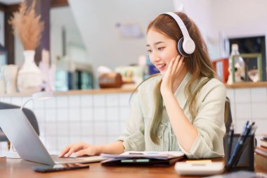 Remote work concept, Woman entrepreneur chatting and meeting on video call in coworking space.