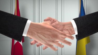Danimarka ve Ukrayna diplomasisi animasyon anlaşması. İş adamı ortağı tokalaşması. Arka planda ulusal bayrak