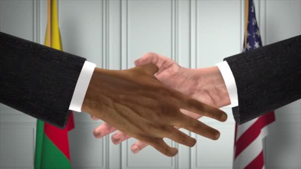 ベナンと米国のパートナーシップビジネス契約 国旗を掲揚 公式外交握手イラストアニメーション 契約ビジネスマンの手を振る — ストック動画