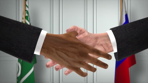 サウジアラビアとロシアは握手 政治イラストを扱っています 正式な会議や協力 ビジネスミーティング ビジネスマンや政治家が握手をする — ストック動画