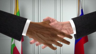 Myanmar ve Rusya el sıkışma, siyaset illüstrasyonu. Resmi toplantı ya da iş birliği, iş görüşmesi. İş adamları veya politikacılar el sıkışıyor
