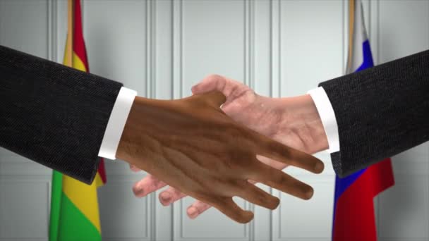 マリとロシアは握手 政治イラストを扱う 正式な会議や協力 ビジネスミーティング ビジネスマンや政治家が握手をする — ストック動画
