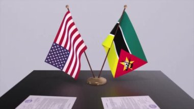 Mozambik ve ABD müzakere masasında, diplomatik bir anlaşma. İş ve politika animasyonu. Ulusal bayraklar, diplomasi anlaşması. Kağıt belgeler masanın üstünde. Uluslararası anlaşma