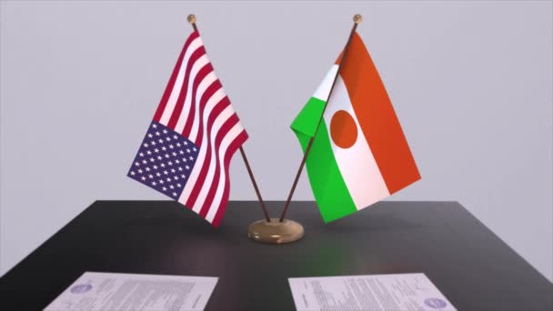 ニジェールと米国は交渉の場で 外交協定 ビジネスと政治のアニメーション 国旗外交協定だ 机の上の書類 国際協定 — ストック動画