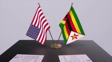 Zimbabwe ve ABD müzakere masasında, diplomatik bir anlaşma. İş ve politika animasyonu. Ulusal bayraklar, diplomasi anlaşması. Kağıt belgeler masanın üstünde. Uluslararası anlaşma